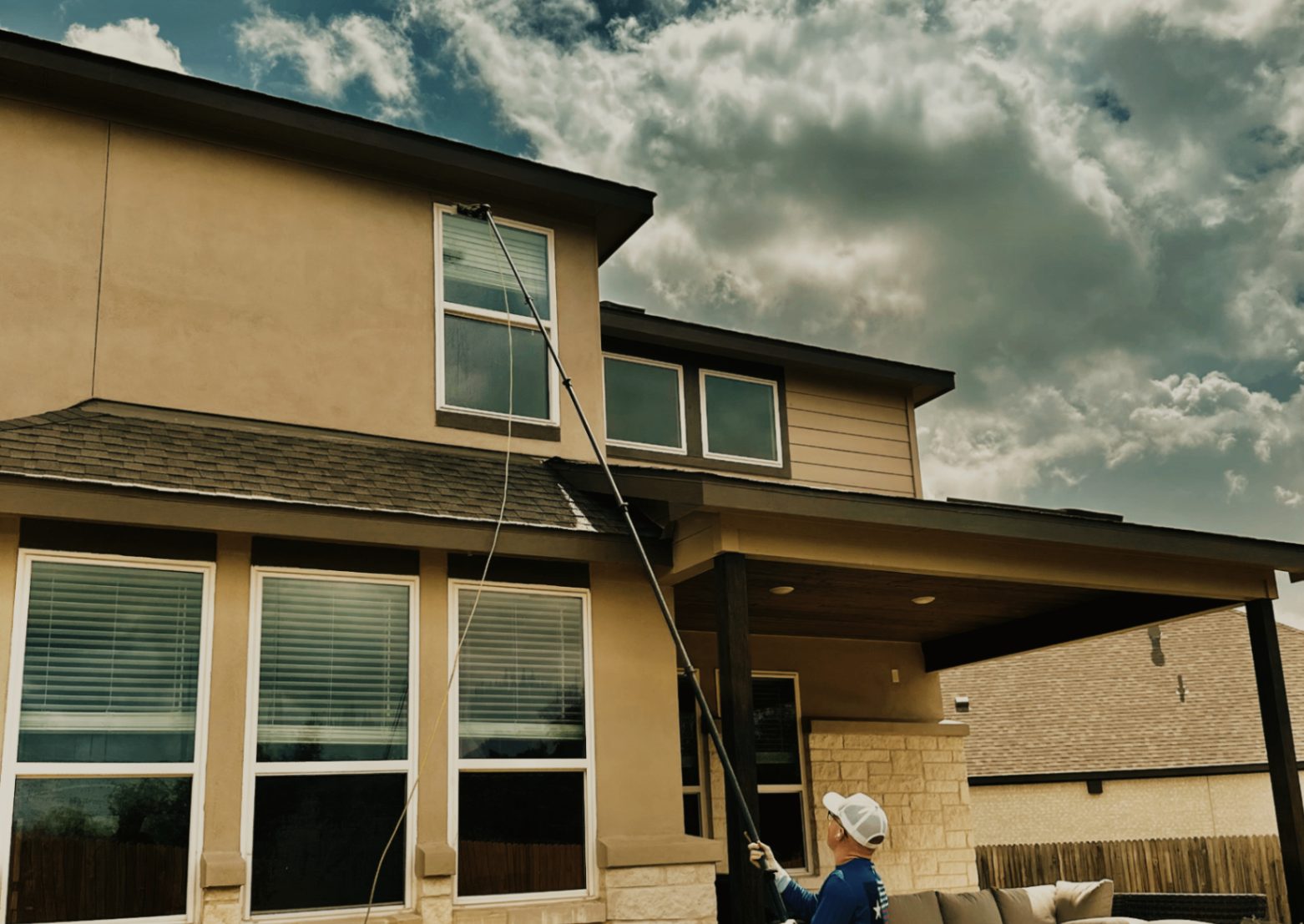 Gutter cleaning on a custom South Texas home
