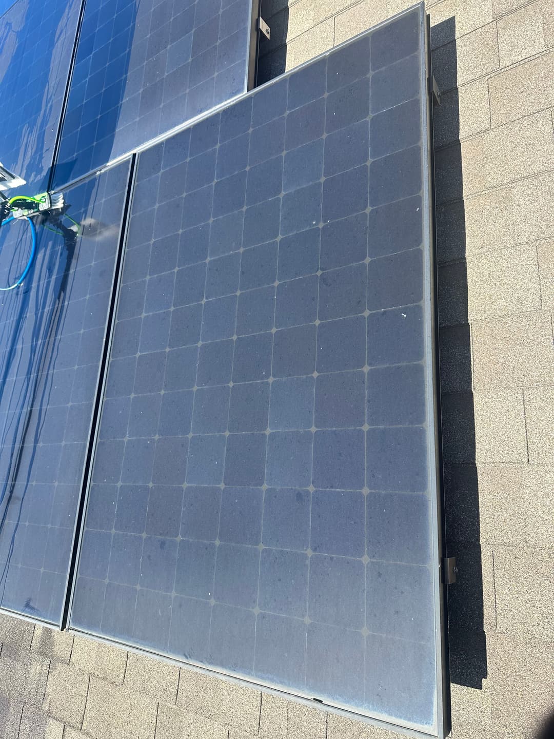 Solar panels installed on a rooftop, showcasing a clean energy solution.